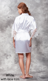 White satin robe with lace trim details.